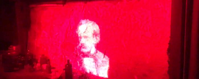 Mr Gatty projected on the wall of his shed